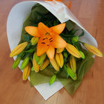 Have Virginia Mary Florist in Bendigo deliver one of their most popular designs with a bunch of wrapped lilies. 